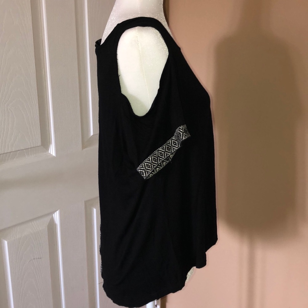 “Gladys”showing off in aBlack cold shoulder blouse